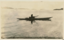 Image of Kayak- Oodee bringing home a seal